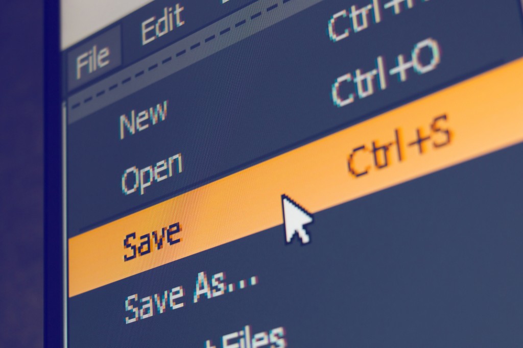 Software menu item with save command highlighted and mouse cursor selected it, macro shot